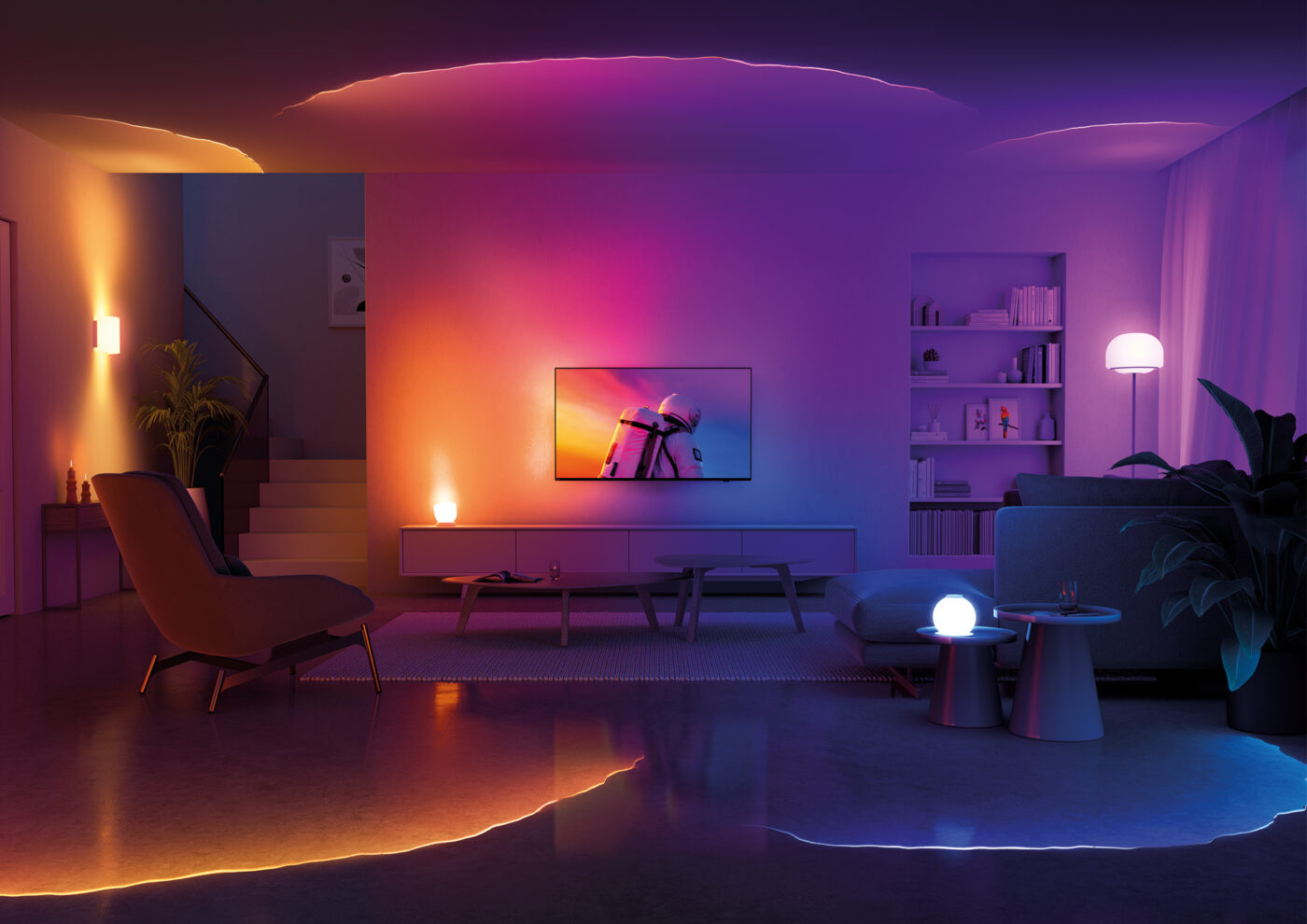 Wohnzimmer mit Philips AmbiScape: TV mit Ambilight synchronisiert smarte Leuchten in Orange, Lila und Blau