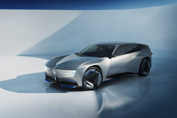 Opel STX Concept in Silber, 3/4-Frontansicht im Studio, blaue LED-Akzente, Opel Vizor